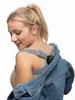 A woman wearing a posture trainer and a denim jacket. Podgląd zdjęcia produktu