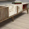 A close-up view of a modern media console with a marble top and wooden accents. Anteprima dell’immagine prodotto