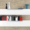 Shelves with decorative items and books. Voir les images du produit