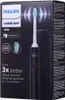 The image shows the packaging of a Philips Sonicare 3100 electric toothbrush. Produktbild-Vorschau