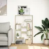 A modern living room scene with a bookshelf, sofa, and plant. Voir les images du produit