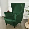 A green velvet wingback chair cover is shown in a room setting. Anteprima dell’immagine prodotto