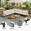 An outdoor patio setting with a sectional sofa, coffee tables, and an umbrella. Produktbild-Vorschau
