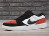 A single Nike SB Force 58 shoe is displayed against a brick wall and wooden floor. Produktbild-Vorschau