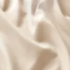 A close-up, abstract view of draped fabric. Produktbild-Vorschau