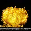 A tangled ball of yellow string lights against a black background, with German text describing different lighting modes. Náhľad obrázku produktu