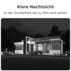 A modern house at night with exterior lighting and landscaping. Produktbild-Vorschau