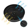 A black circular activated carbon filter with arrows indicating airflow and a close-up of the carbon granules. Produktbild-Vorschau