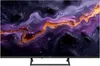 A television set with a colorful abstract image displayed on its screen, placed on a stand. Produktbild-Vorschau