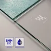Close-up of two pieces of glass, one with a textured pattern and the other clear with water droplets and a logo. There are also two small square icons with text and graphics. Produktbild-Vorschau