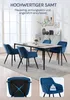 A dining table with four blue chairs, set in a well-lit room with a sideboard in the background. Two close-up insets show the underside of a chair and a close-up of a chair with a weight icon. Náhľad obrázku produktu