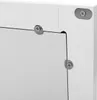 A close-up view of the corner of a white cabinet, showing how a glass panel is attached with metal screws and brackets. Náhled obrázku produktu