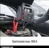 A person is using a jump starter to start a car. Produktbild-Vorschau