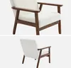A close-up view of a white boucle armchair with wooden legs and arms, shown from two different angles. Anteprima dell’immagine prodotto
