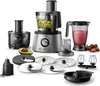 A food processor with various attachments, a blender jug, and some fruit are displayed against a white background. Anteprima dell’immagine prodotto