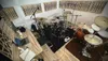 A recording studio with a drum set and acoustic wall panels. Podgląd zdjęcia produktu