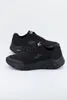 A pair of black Skechers Arch Fit sneakers are shown against a white background. Produktbild-Vorschau