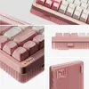 A collage of close-up shots of a pink mechanical keyboard. Voir les images du produit
