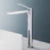 A chrome faucet is shown in a studio setting, positioned over a white sink. Náhľad obrázku produktu