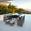An outdoor patio set with chairs and a table next to a swimming pool with a scenic view. Voir les images du produit