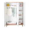An open wardrobe with baby clothes and toys inside. Anteprima dell’immagine prodotto