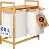 A bamboo laundry basket with two white fabric bags. Produktbild-Vorschau
