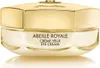 A close-up studio shot of a luxury eye cream jar. Voir les images du produit