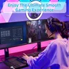 A woman wearing a headset is playing a video game on a dual monitor setup. The room is lit with pink and purple LED lights, and there are triangular LED panels on the wall. Produktbild-Vorschau