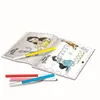 An open coloring book with Disney Princess characters and markers on a white background. Náhled obrázku produktu