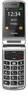 A flip phone is shown open against a white background. Voir les images du produit