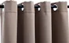 A close-up view of four taupe-colored curtains hanging from a dark curtain rod. Voir les images du produit