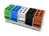 A set of five terminal blocks in different colors, mounted on a gray base. Anteprima dell’immagine prodotto