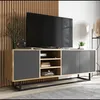 A modern TV stand with a TV on top, set against a slatted wood panel wall. Produktbild-Vorschau