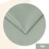A close-up of a mint green fabric folded, with a numerical identifier in the corner. Anteprima dell’immagine prodotto