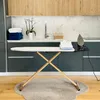 A laundry room setting with an ironing board, iron, and folded clothes. Produktbild-Vorschau