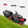 A black and red electric lawnmower is shown on a green grassy slope, with text overlays indicating its specifications. Náhled obrázku produktu