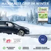 A car driving through snow with snow chains on its tires. Podgląd zdjęcia produktu