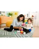 A woman and a baby are playing with stacking cups on a rug. Produktbild-Vorschau