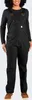 A woman is shown wearing black overalls and a black long-sleeved shirt, with brown shoes. Produktbild-Vorschau