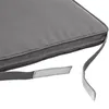 A close-up view of a gray cushion with attached straps. Náhled obrázku produktu