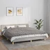 A bedroom scene with a bed, artwork on the wall, and a plant. Produktbild-Vorschau