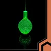 A green ultrasonic humidifier and aroma diffuser with a starburst pattern is displayed against a black background. Produktbild-Vorschau