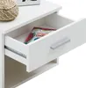 Close-up of an open white drawer in a nightstand, with a magazine inside. Produktbild-Vorschau