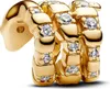 A close-up studio shot of a gold charm with clear stones. Produktbild-Vorschau