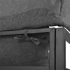 A close-up view of a dark gray cushion tied to a black metal frame with a fabric tie. Produktbild-Vorschau