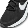 Close-up view of the front of a black Nike sneaker with a white Nike swoosh logo. Voir les images du produit