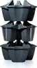 A stack of dark gray plastic planters. Náhľad obrázku produktu