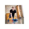 A man is doing a plank exercise on a blue balance board in a gym. Produktbild-Vorschau