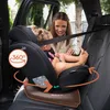 A woman is securing a child in a car seat inside a vehicle. Produktbild-Vorschau