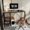 A home office setup with a desk, computer, chair, and shelving unit. Podgląd zdjęcia produktu